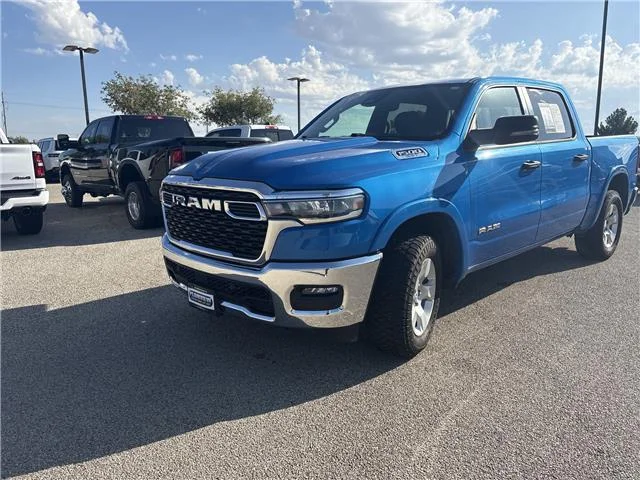 Used 2025 Hydro Blue Pearlcoat RAM Big Horn/Lone Star 4x4 Crew Cab 144.5 in. WB image 3