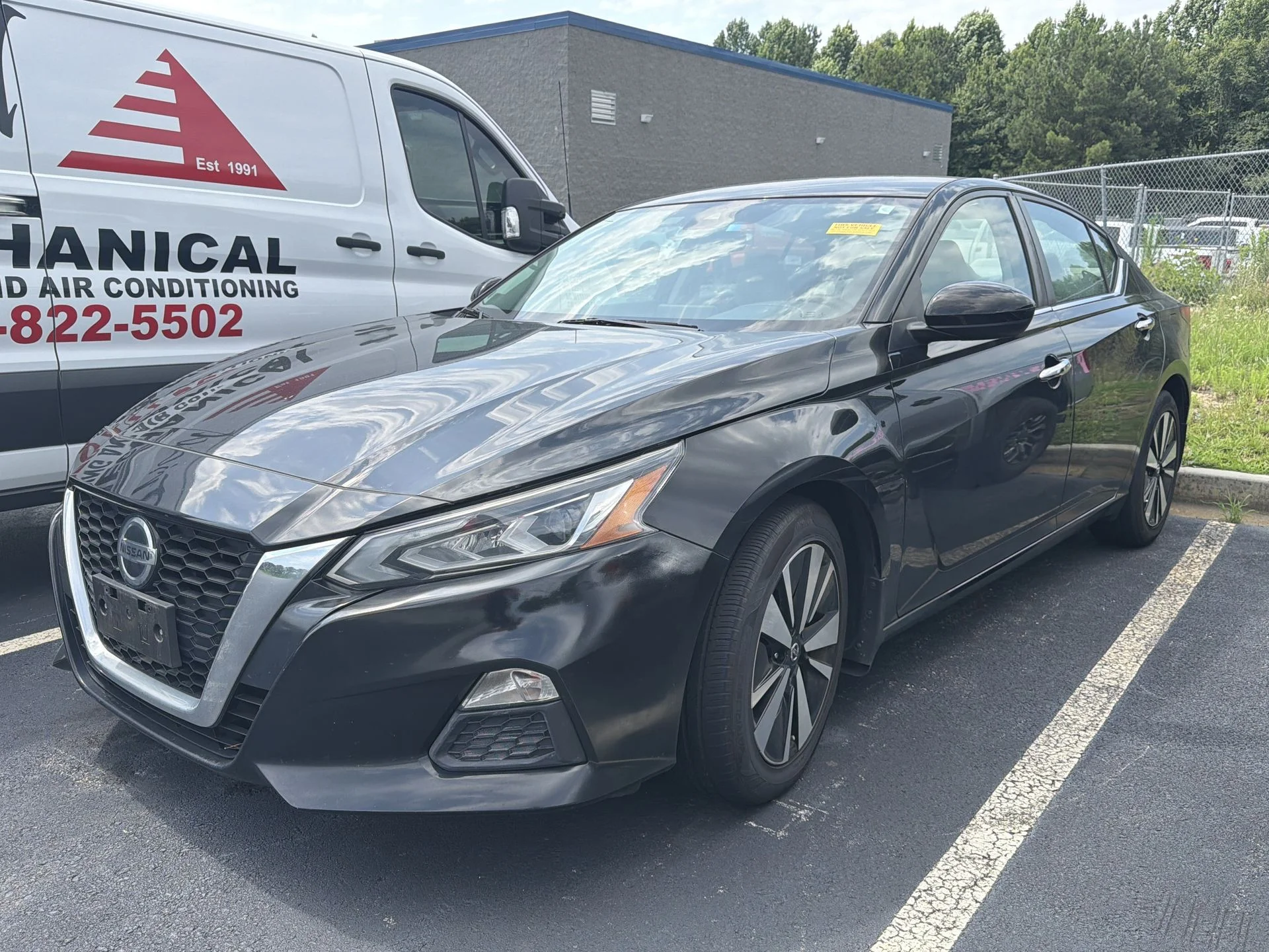 Certified Used 2022 Black Nissan 2.5 SV image 1