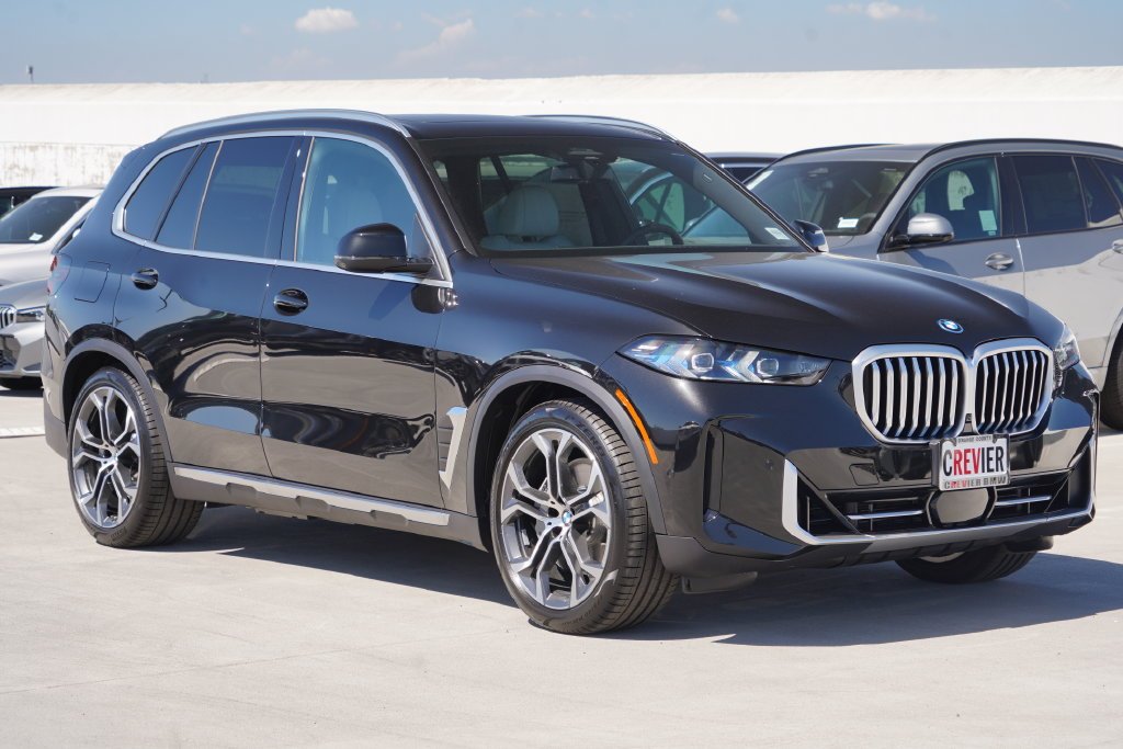 New 2026 Black Sapphire Metallic BMW xDrive50e image 3