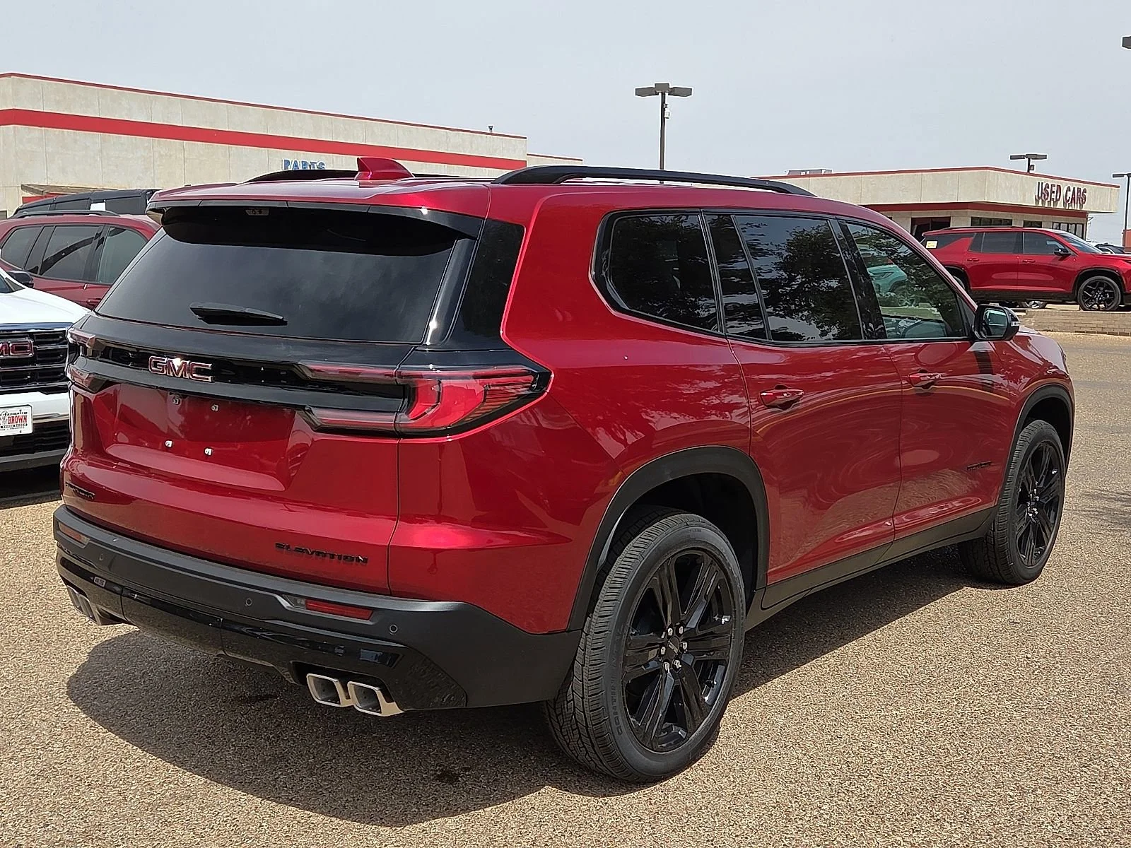 New 2026 Volcanic Red Tintcoat GMC Elevation image 4