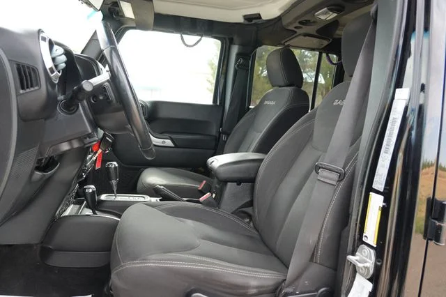Used 2018 Black Jeep Unlimited Sahara image 11