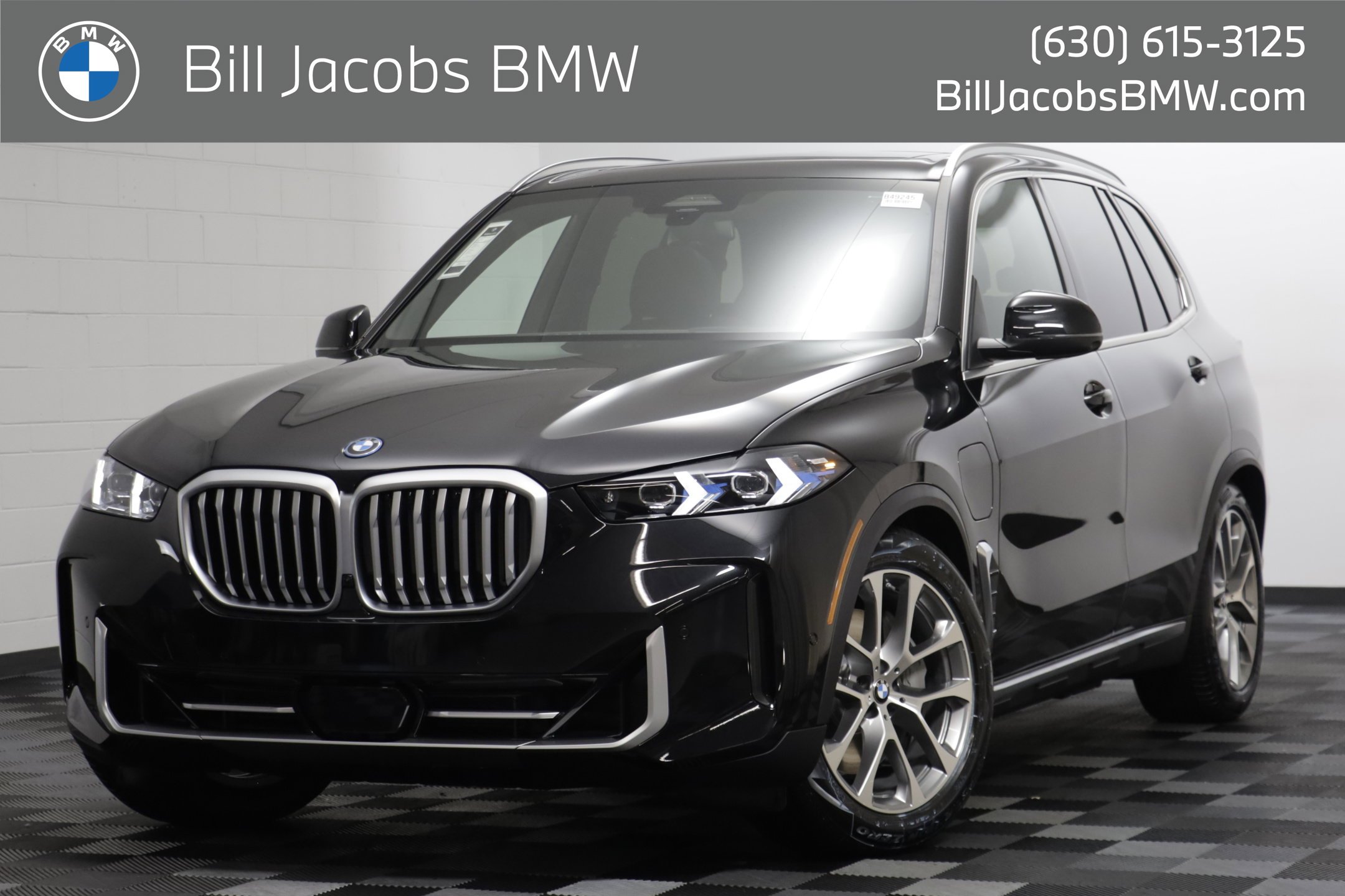 New 2026 Black Sapphire Metallic BMW xDrive50e image 1