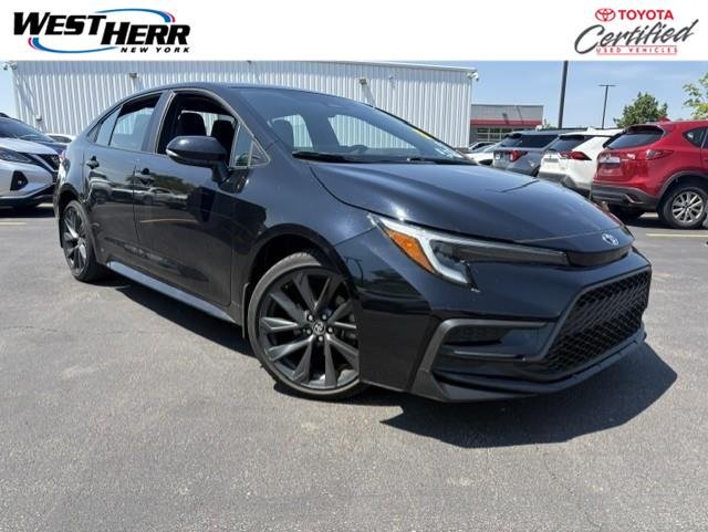Used 2023 Midnight Black Metallic Toyota SE image 1