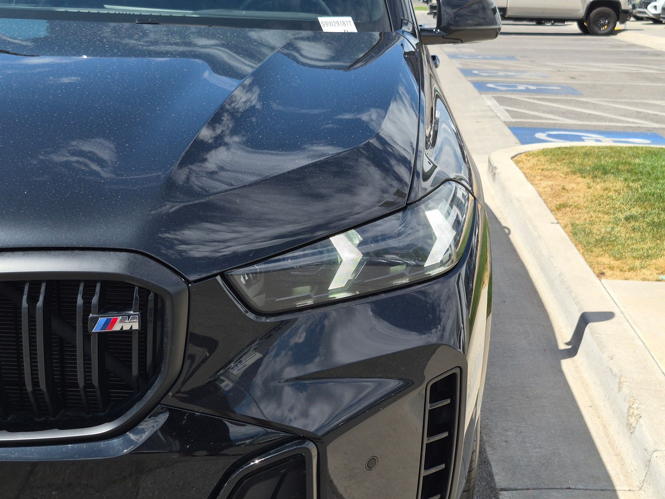 Used 2025 Black Sapphire Metallic BMW M60i image 11