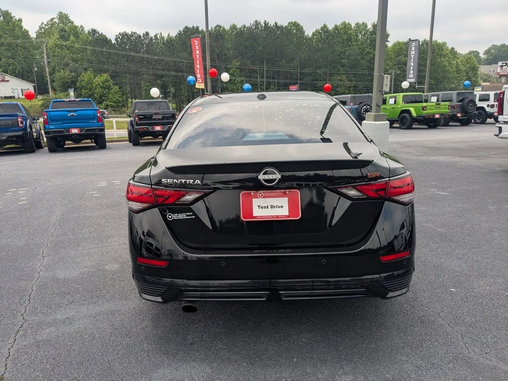 Used 2024 Super Black Nissan SR image 6