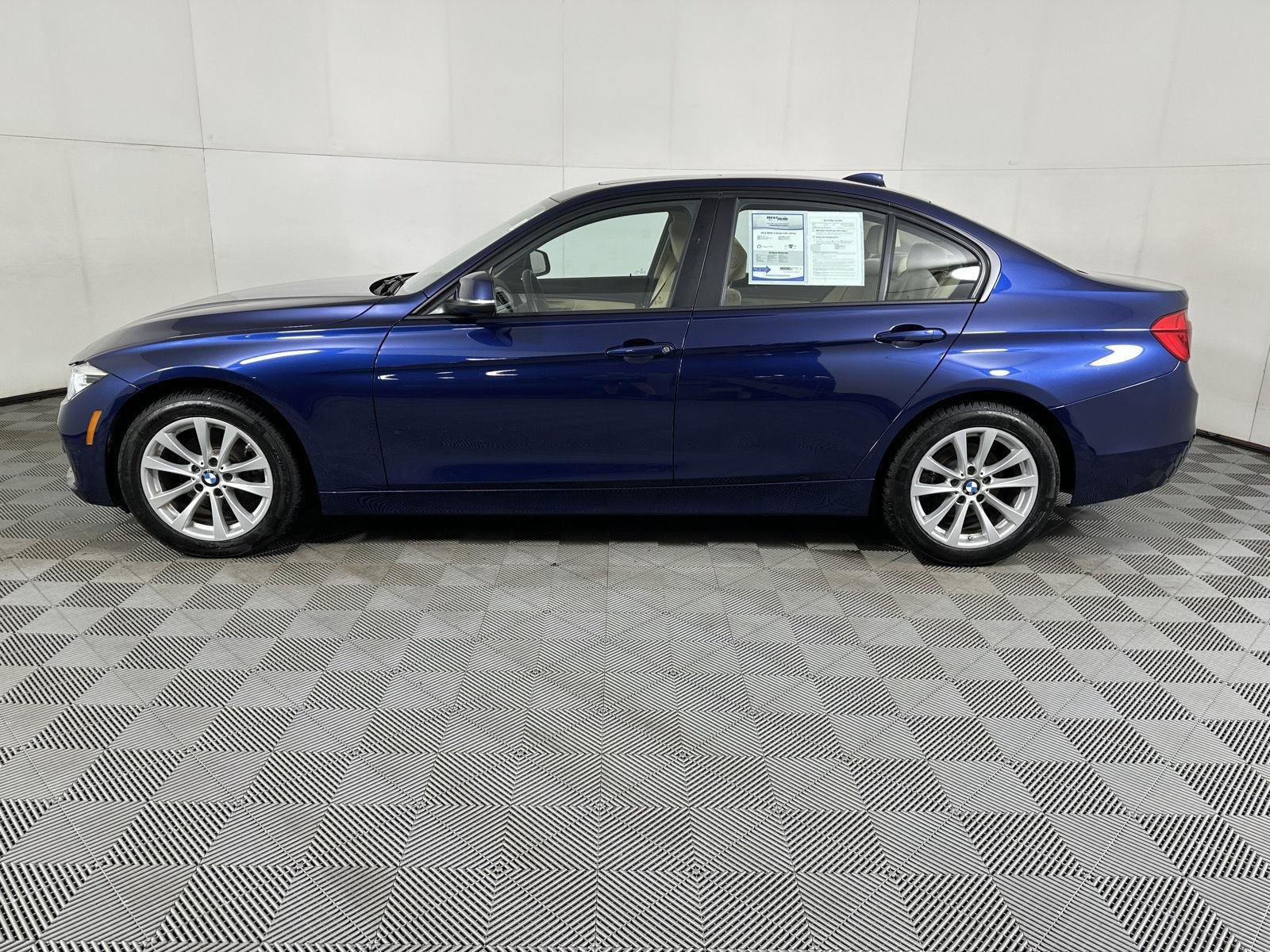 Used 2018 Mediterranean Blue Metallic BMW 320i xDrive image 16