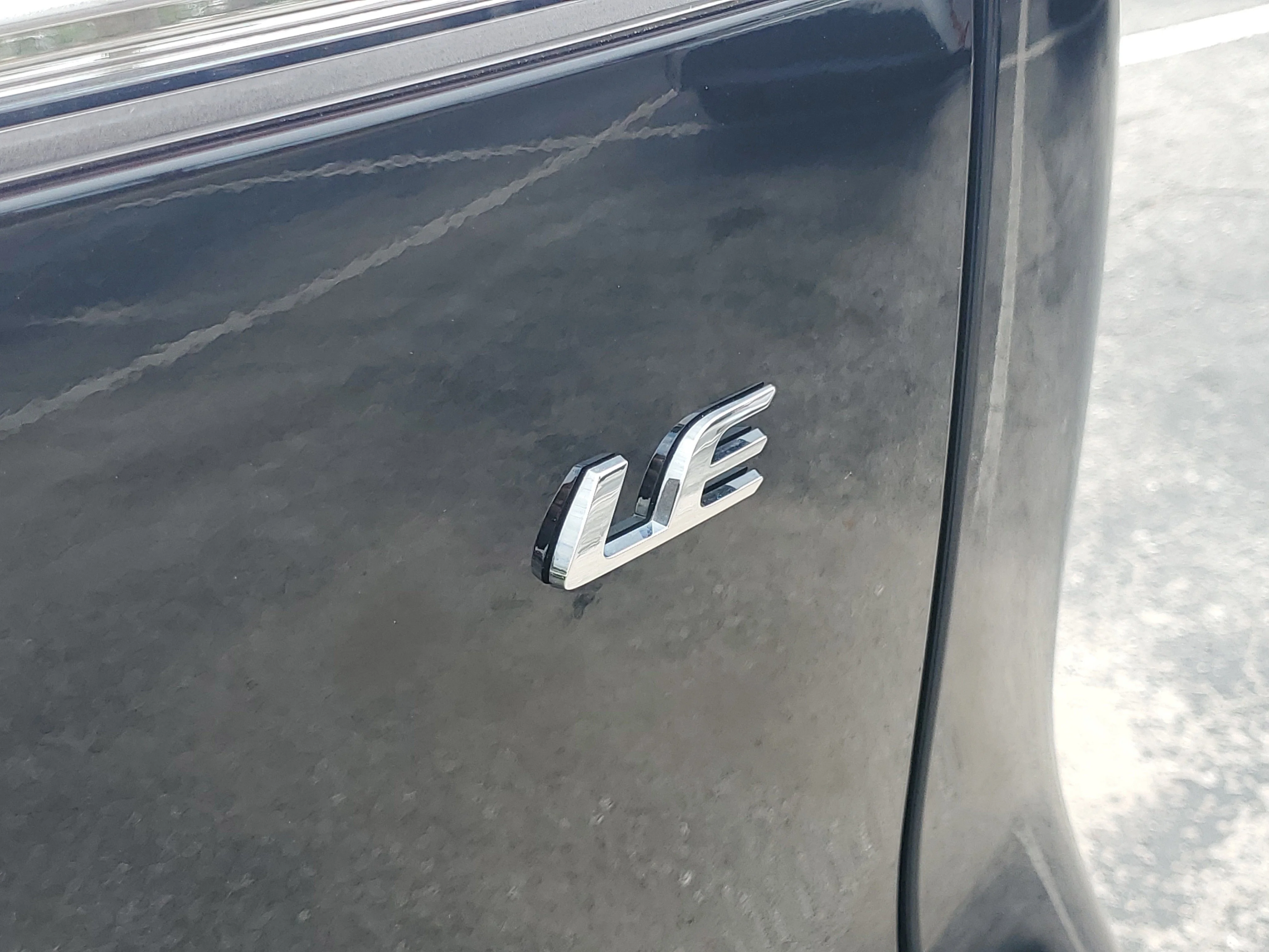 Used 2024 Jet Black Toyota LE image 11