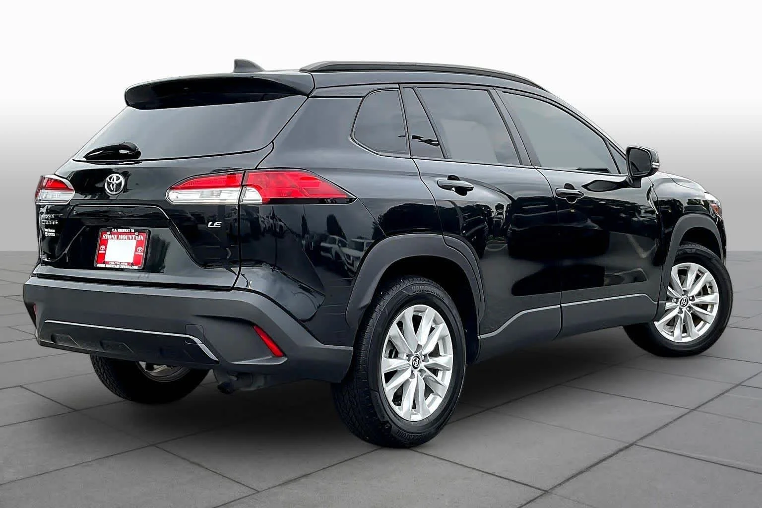 Used 2023 Jet Black Toyota LE image 13