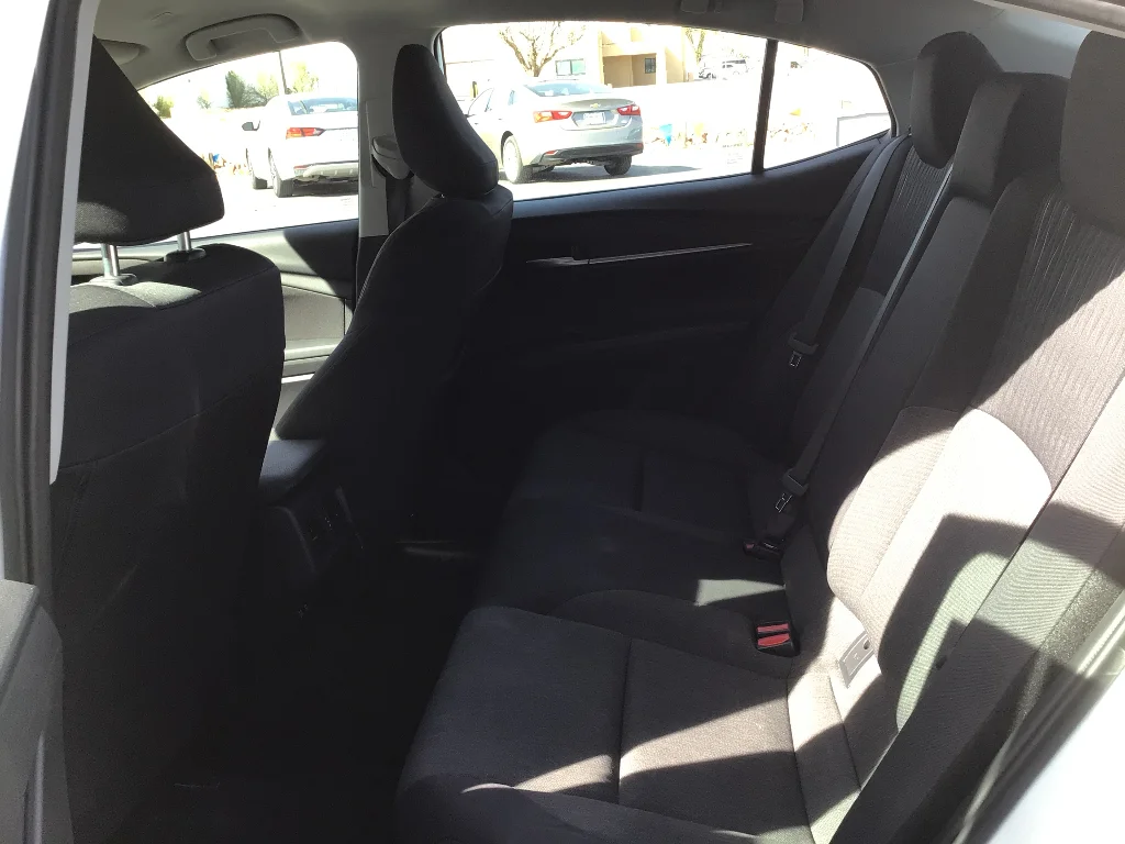 Used 2025 White Toyota LE HYBRID image 8
