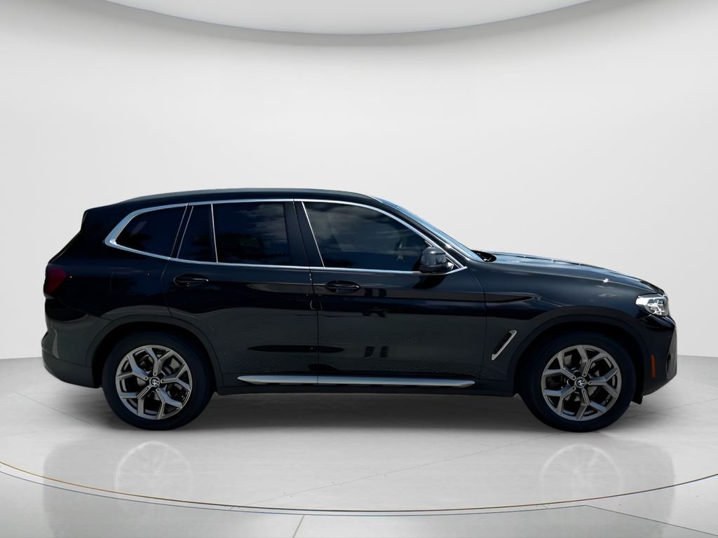 Used 2022 Black Sapphire Metallic BMW sDrive30i image 4