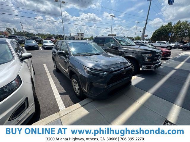 Used 2023 Magnetic Gray Metallic Toyota LE image 1