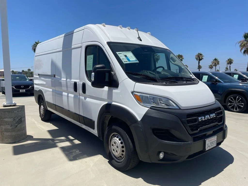 Used 2024 Bright White Clearcoat Ram High Roof image 1