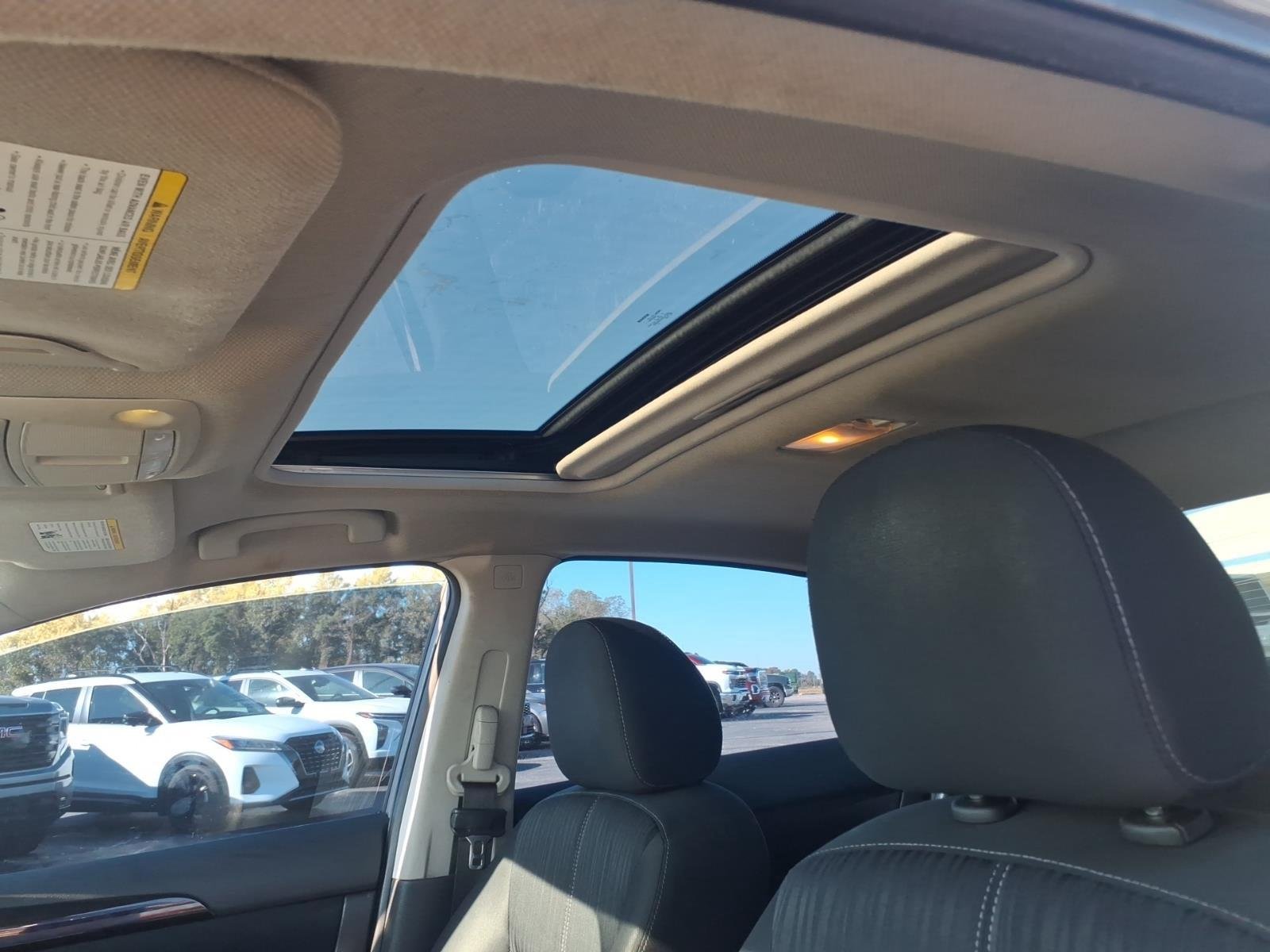 Used 2016 Gun Metallic Nissan SV image 17