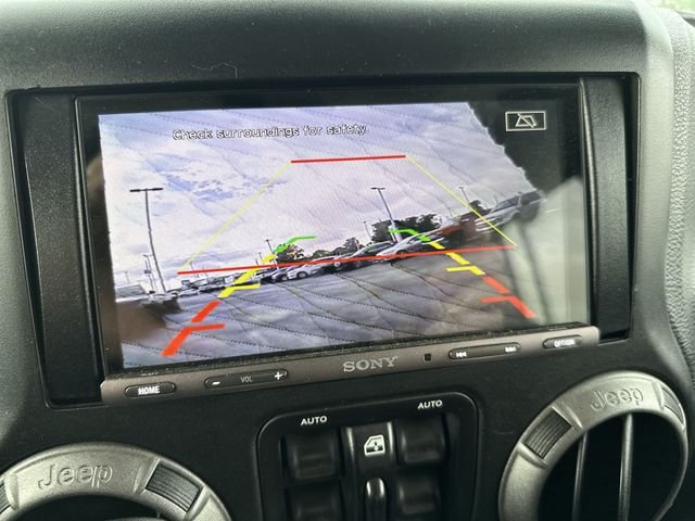 Used 2015 Silver Jeep Unlimited Sport image 26