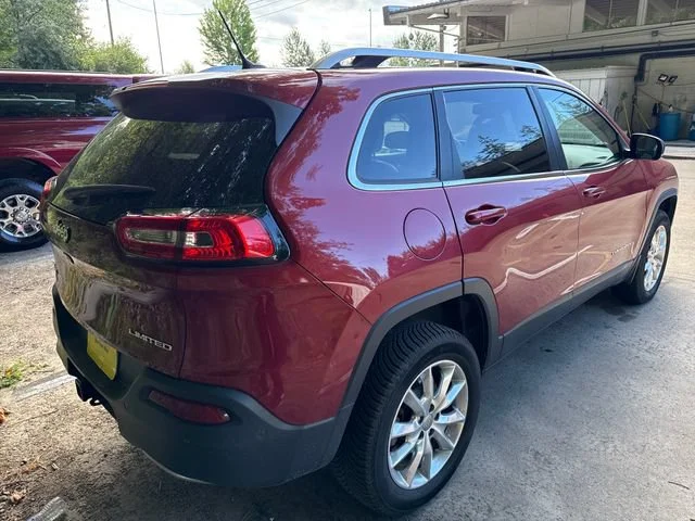 Used 2015 Deep Cherry Red Crystal Pearlcoat Jeep Limited image 7