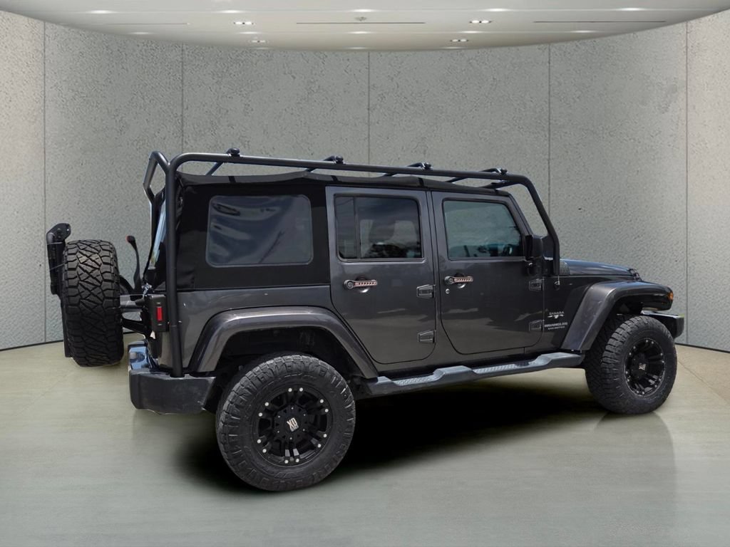 Used 2017 Granite Crystal Metallic Clearcoat Jeep Sahara image 3