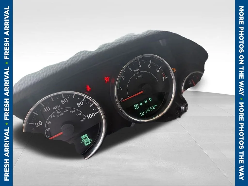 Used 2014 White Jeep Unlimited Sport image 1