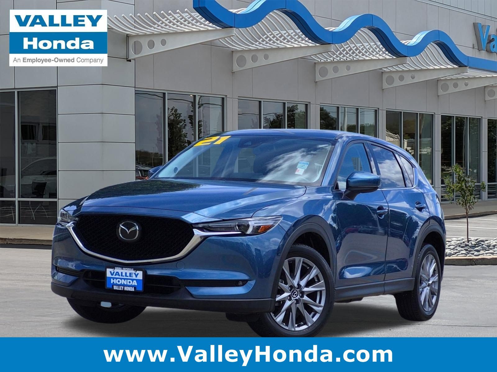 Used 2021 Eternal Blue Mica Mazda Grand Touring AWD image 1