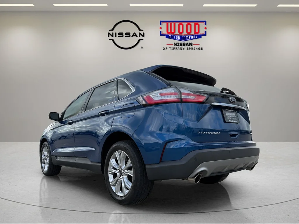 Used 2023 Blue Metallic Ford Titanium image 4