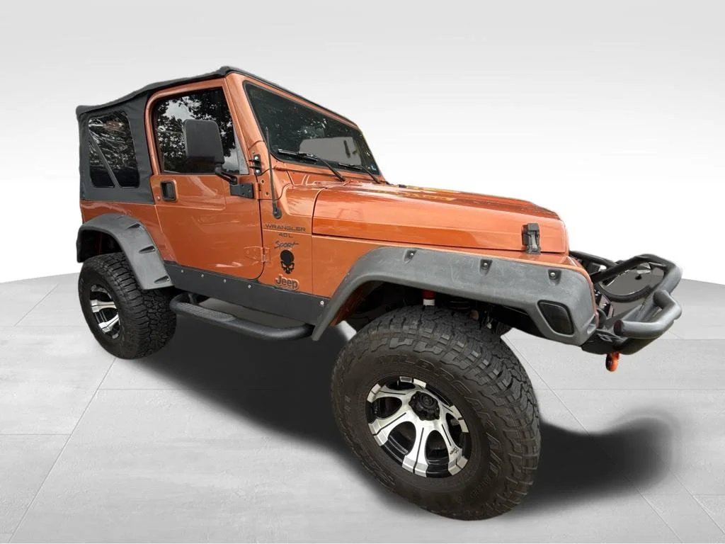 Used 2000 Orange Jeep Sport image 7