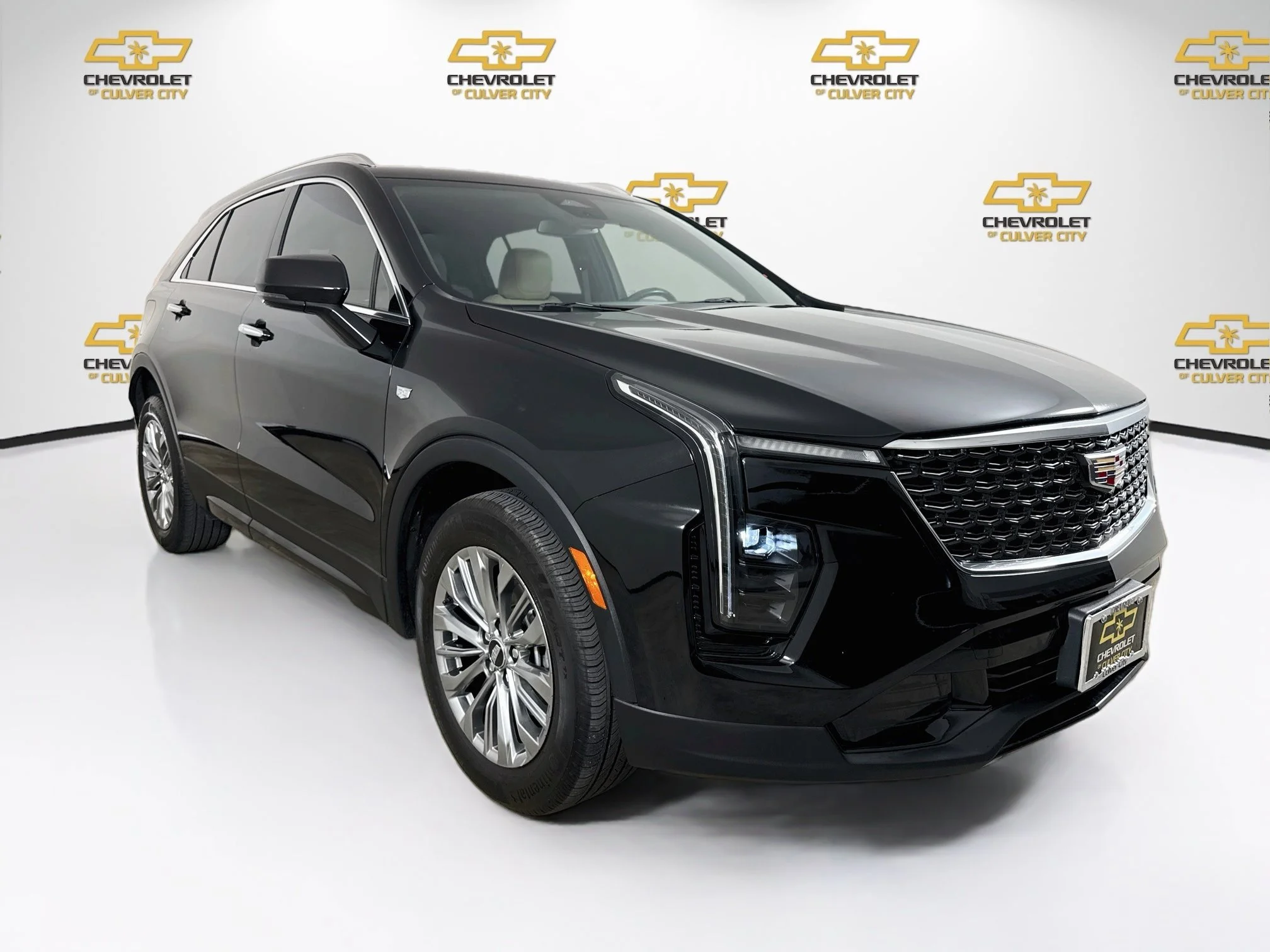 Used 2024 Stellar Black Metallic Cadillac Premium Luxury image 1