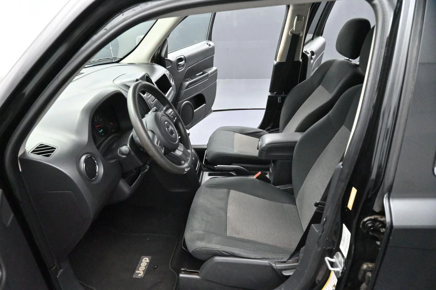 Used 2011 Brilliant Black Crystal Pearl Jeep Sport image 11