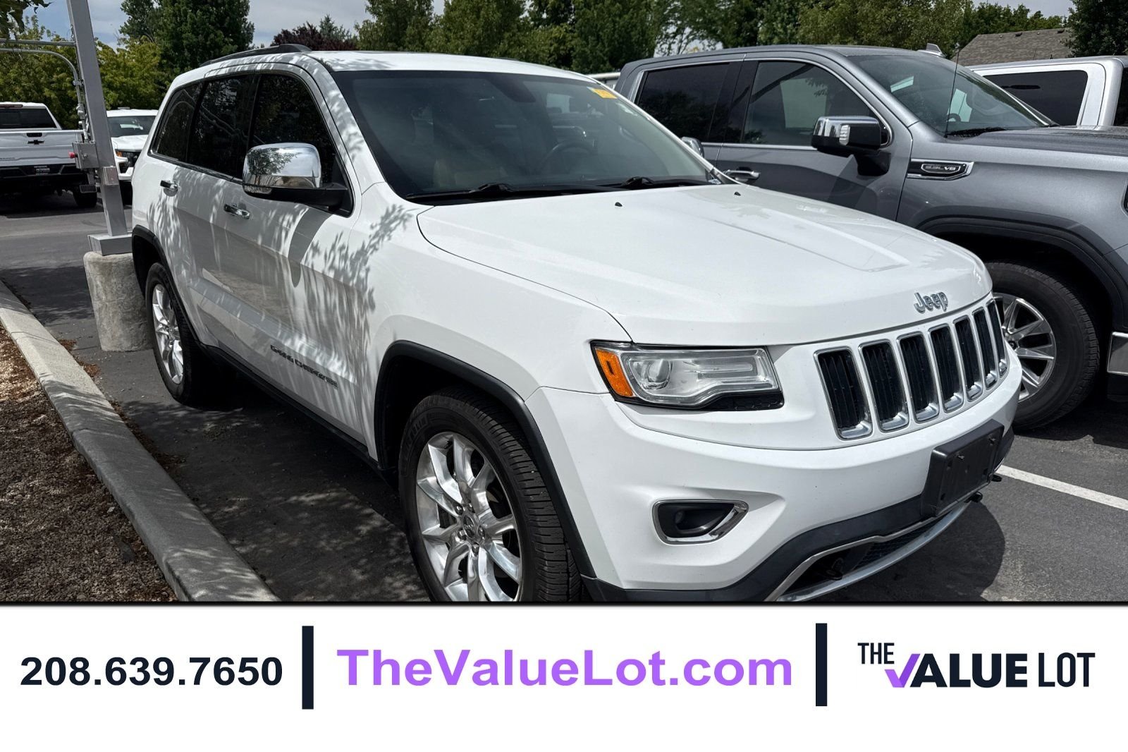 Used 2015 White Jeep Limited image 1