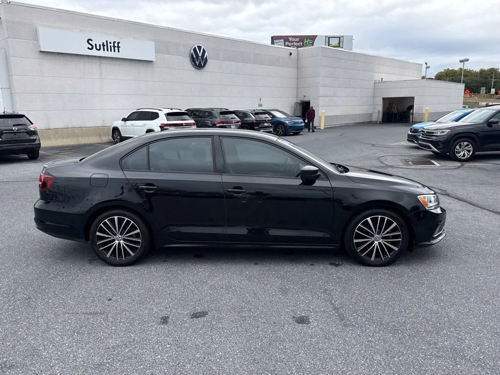 Used 2016 Black Uni Volkswagen 1.8T Sport image 15