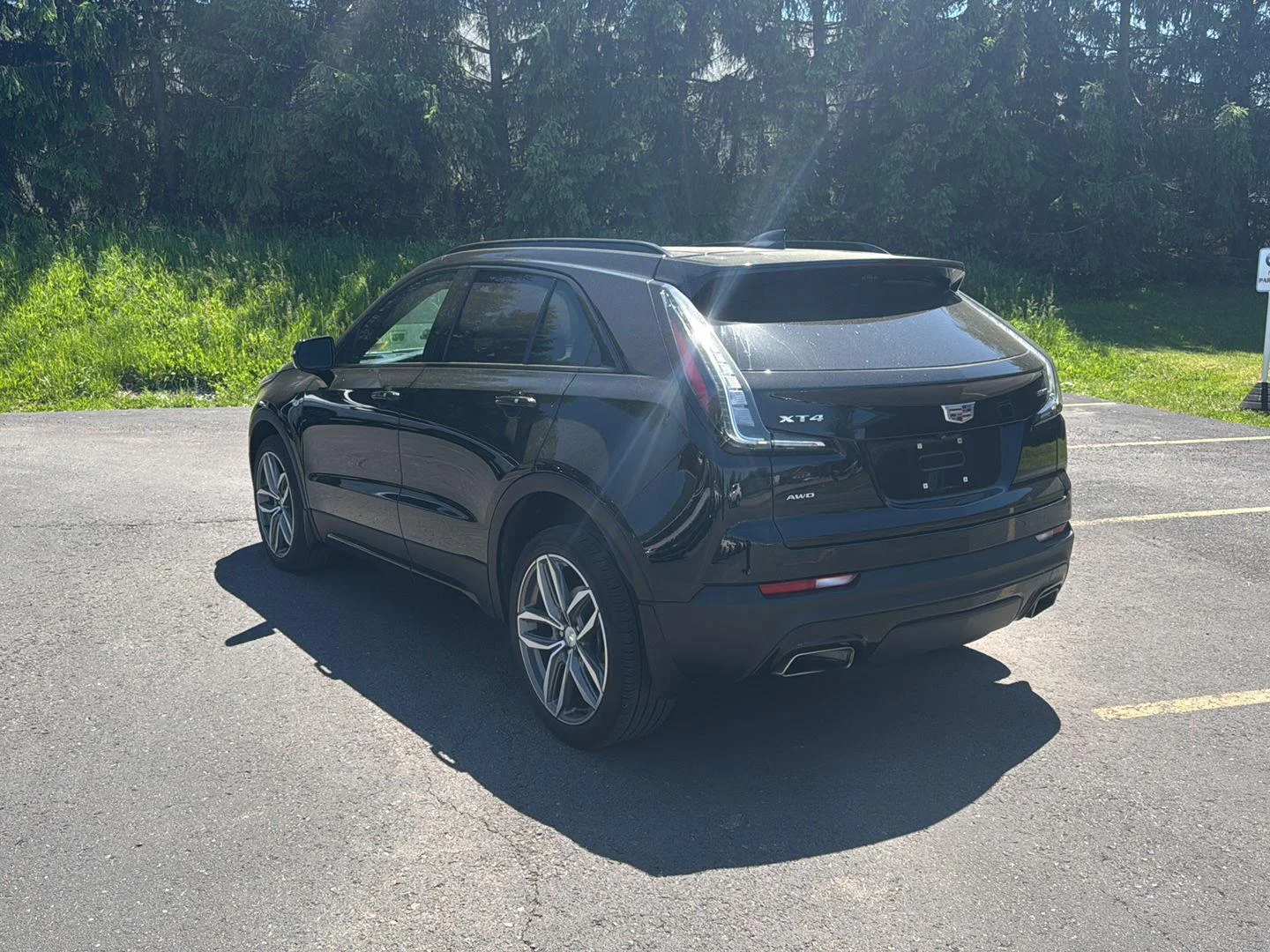 Used 2022 Stellar Black Metallic Cadillac AWD Sport image 5