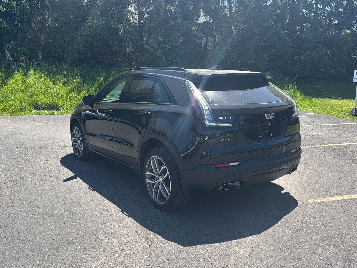 Used 2022 Stellar Black Metallic Cadillac AWD Sport image 5