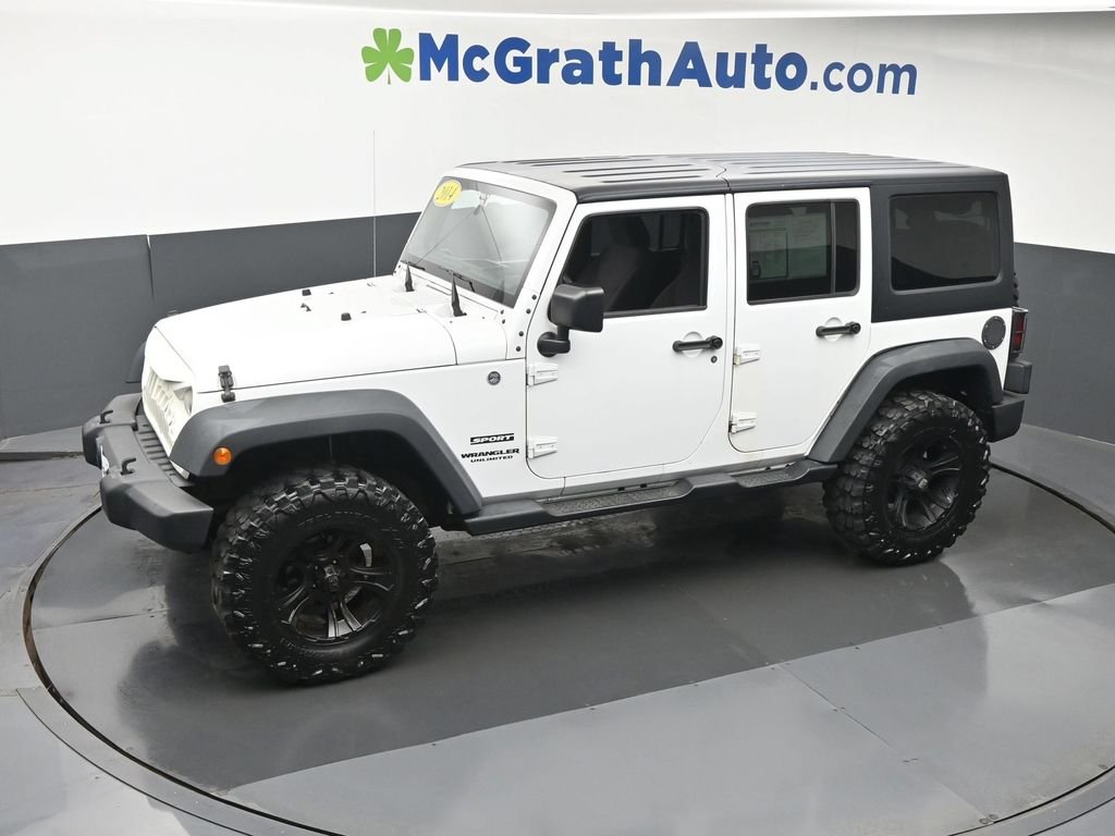 Used 2014 White Jeep Unlimited Sport image 22
