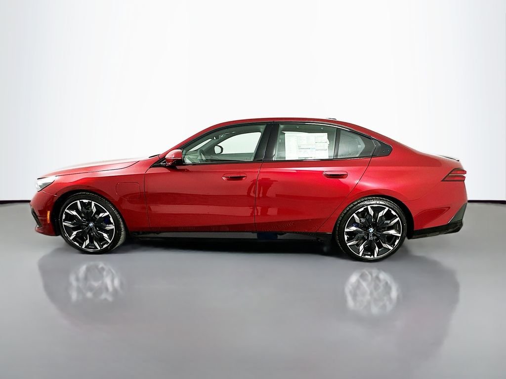 New 2027 Vegas Red Metallic BMW 550e xDrive image 8