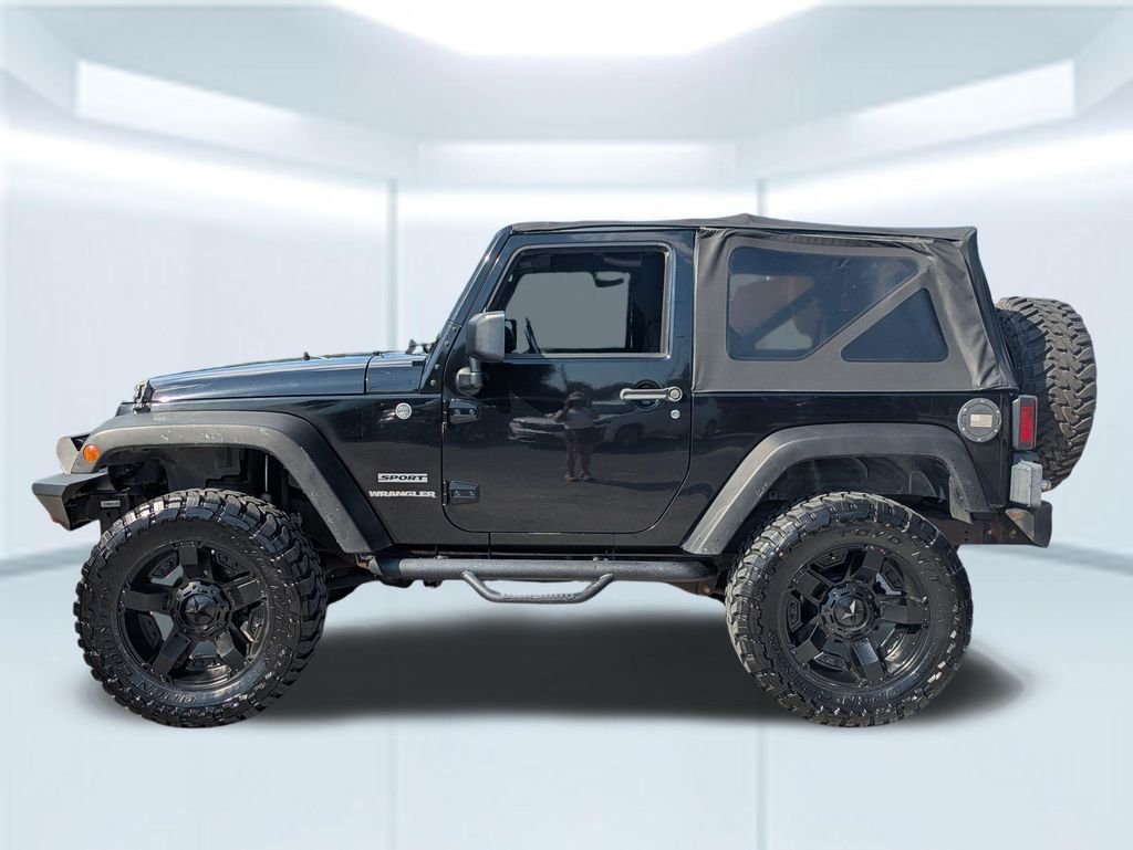 Used 2011 Jeep Wrangler Sport with VIN 1J4AA2D11BL630203 for sale in Foley, AL