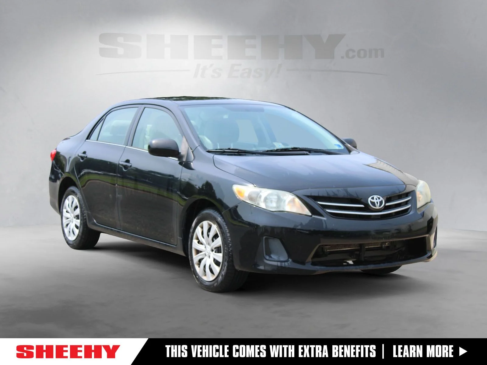 Used 2013 Black Toyota LE image 1