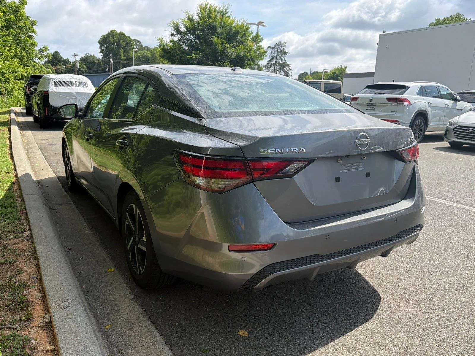 Used 2024 Gun Metallic Nissan SV image 3