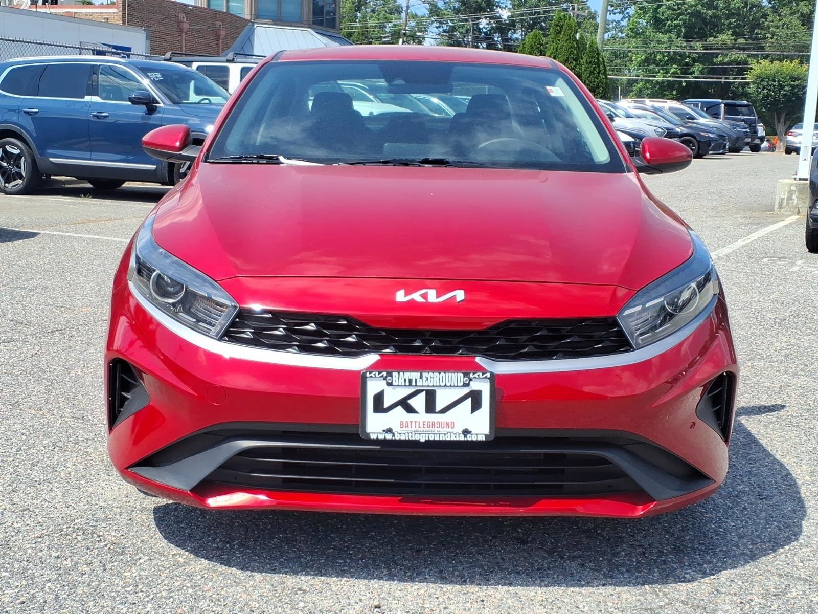 Used 2023 Currant Red Kia LXS image 2