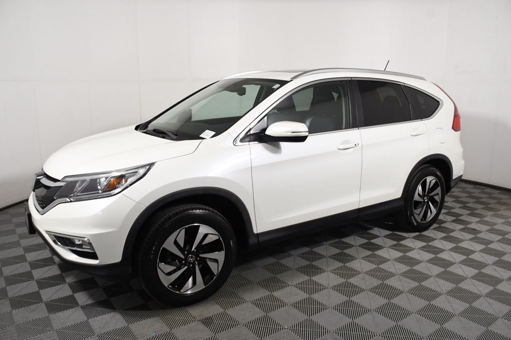 Used 2016 Honda CR-V Touring with VIN 5J6RM4H90GL001187 for sale in Richfield, Minnesota