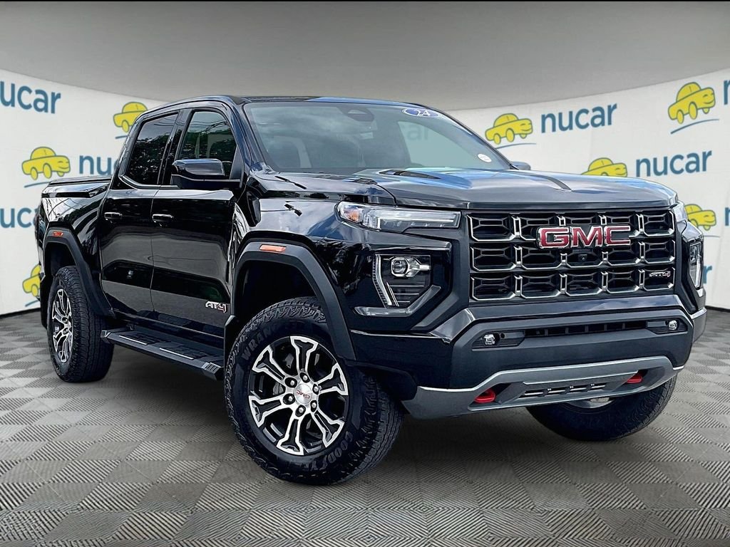 Used 2024 Black GMC AT4 image 1