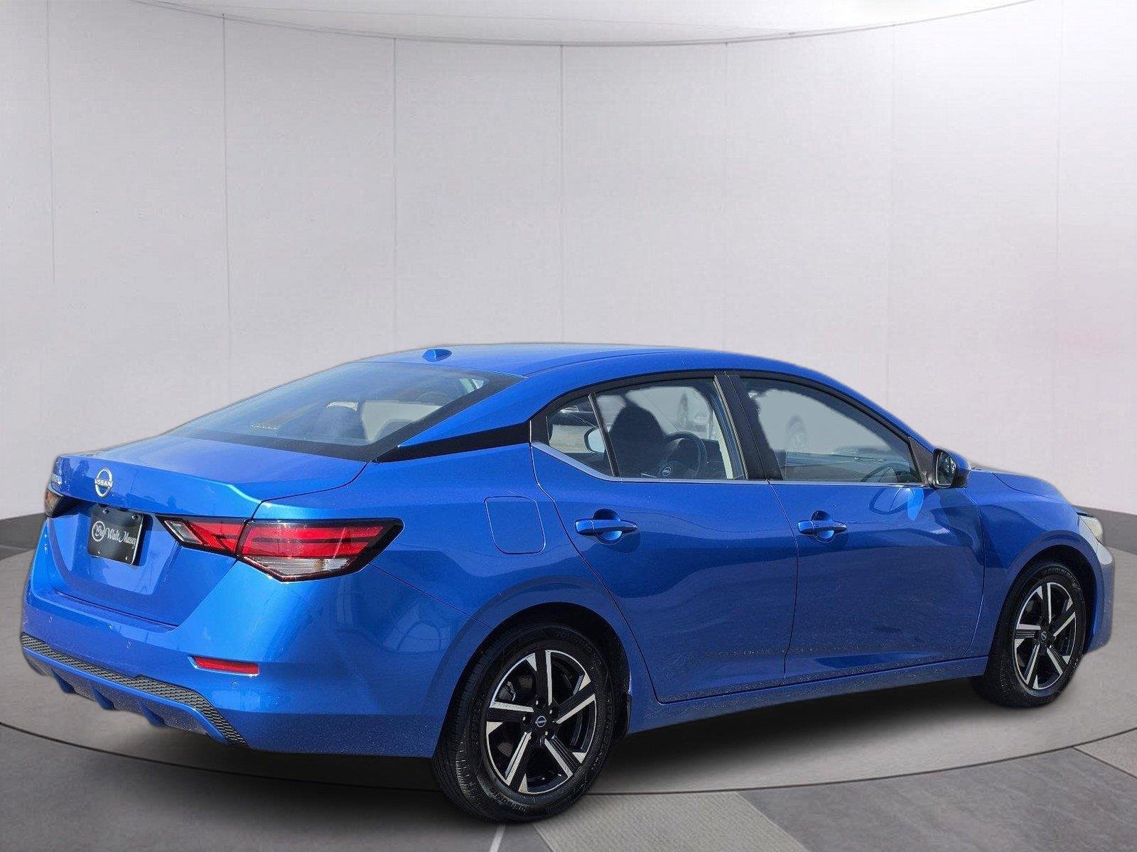 Used 2025 Electric Blue Metallic Nissan SV image 5