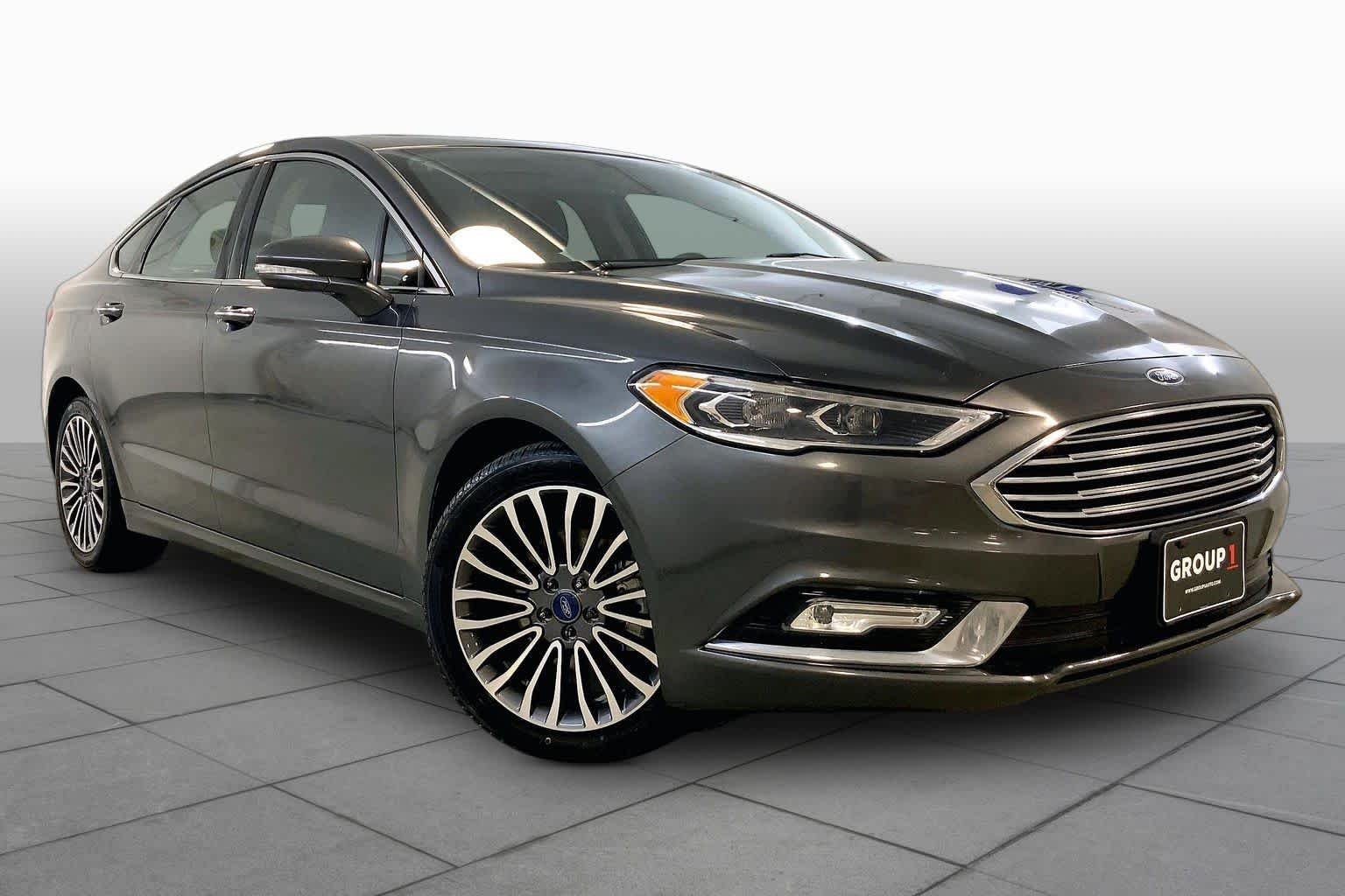 Used 2017 Ford Fusion Titanium with VIN 3FA6P0D90HR410944 for sale in Kansas City