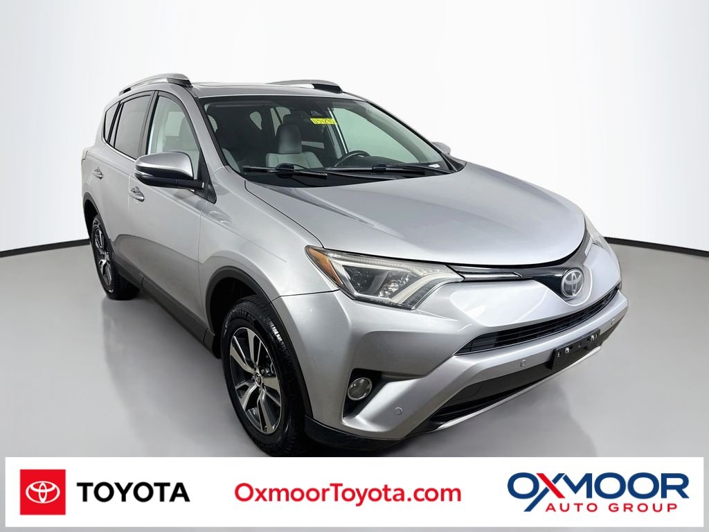 Used 2016 Silver Sky Metallic Toyota XLE image 1