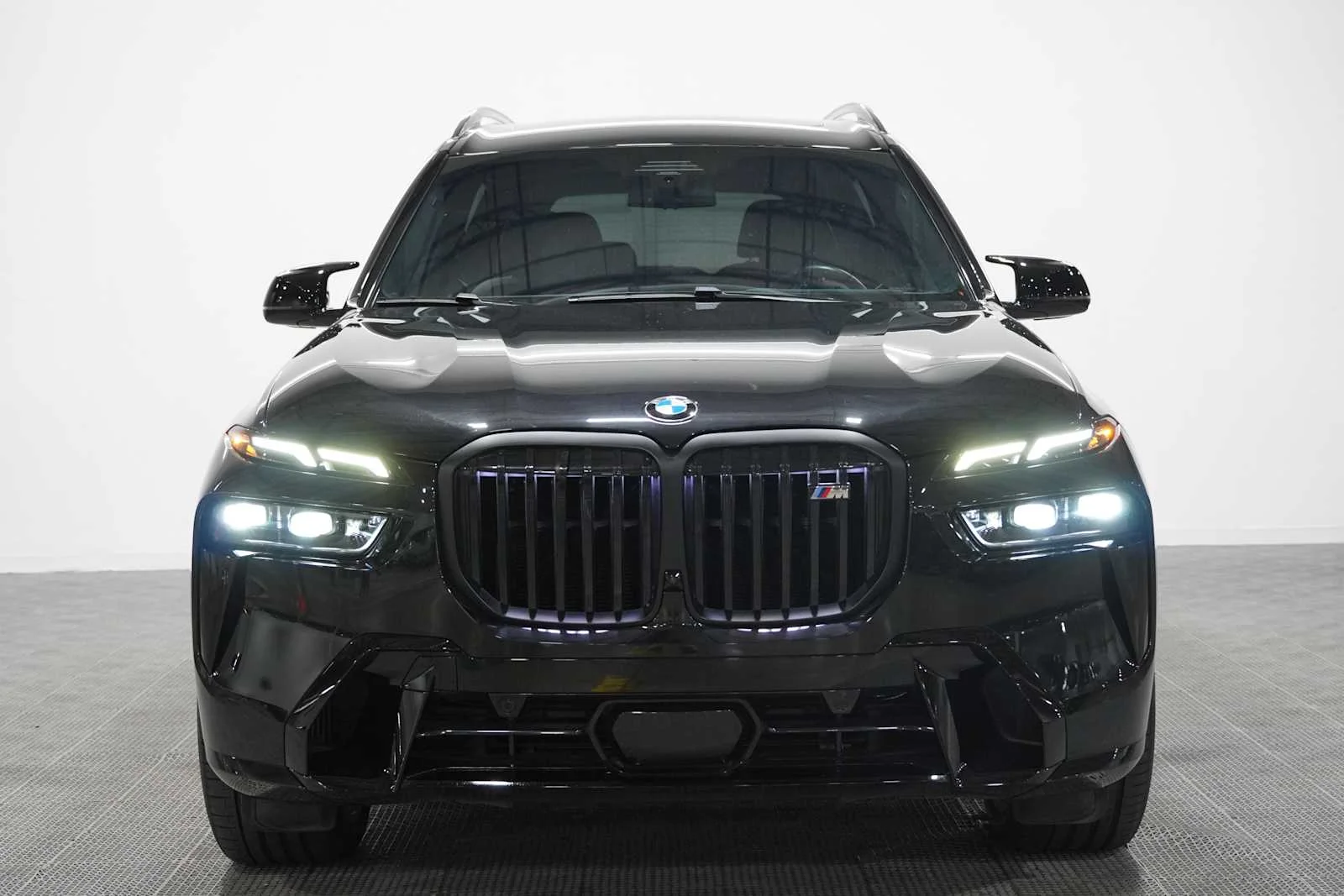 Certified Used 2024 Black Sapphire Metallic BMW M60i image 2