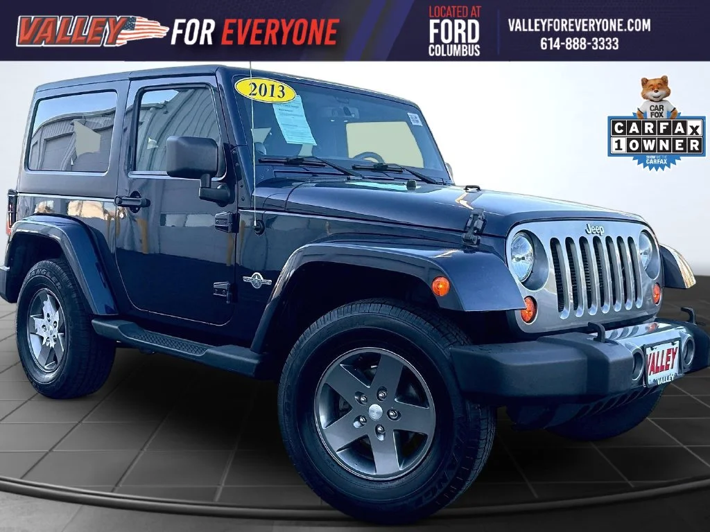 Used 2013 True Blue Pearlcoat Jeep Sport image 1