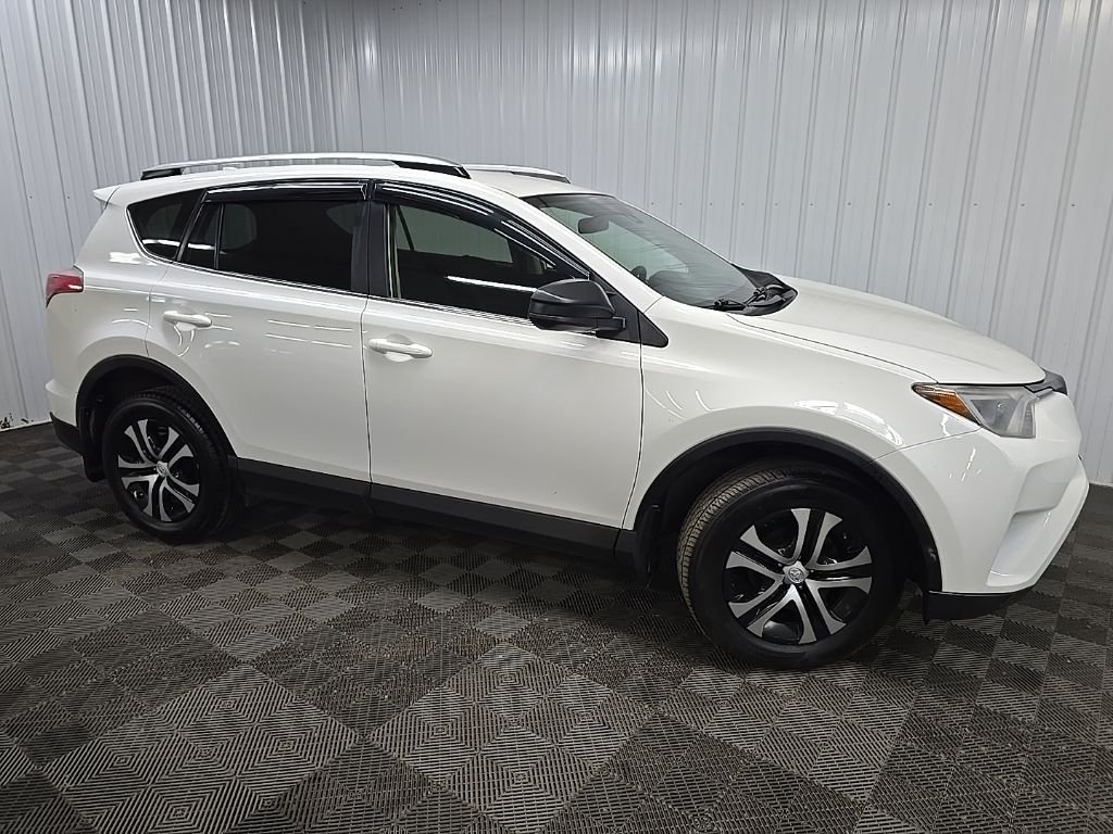 Used 2017 White Toyota LE image 1