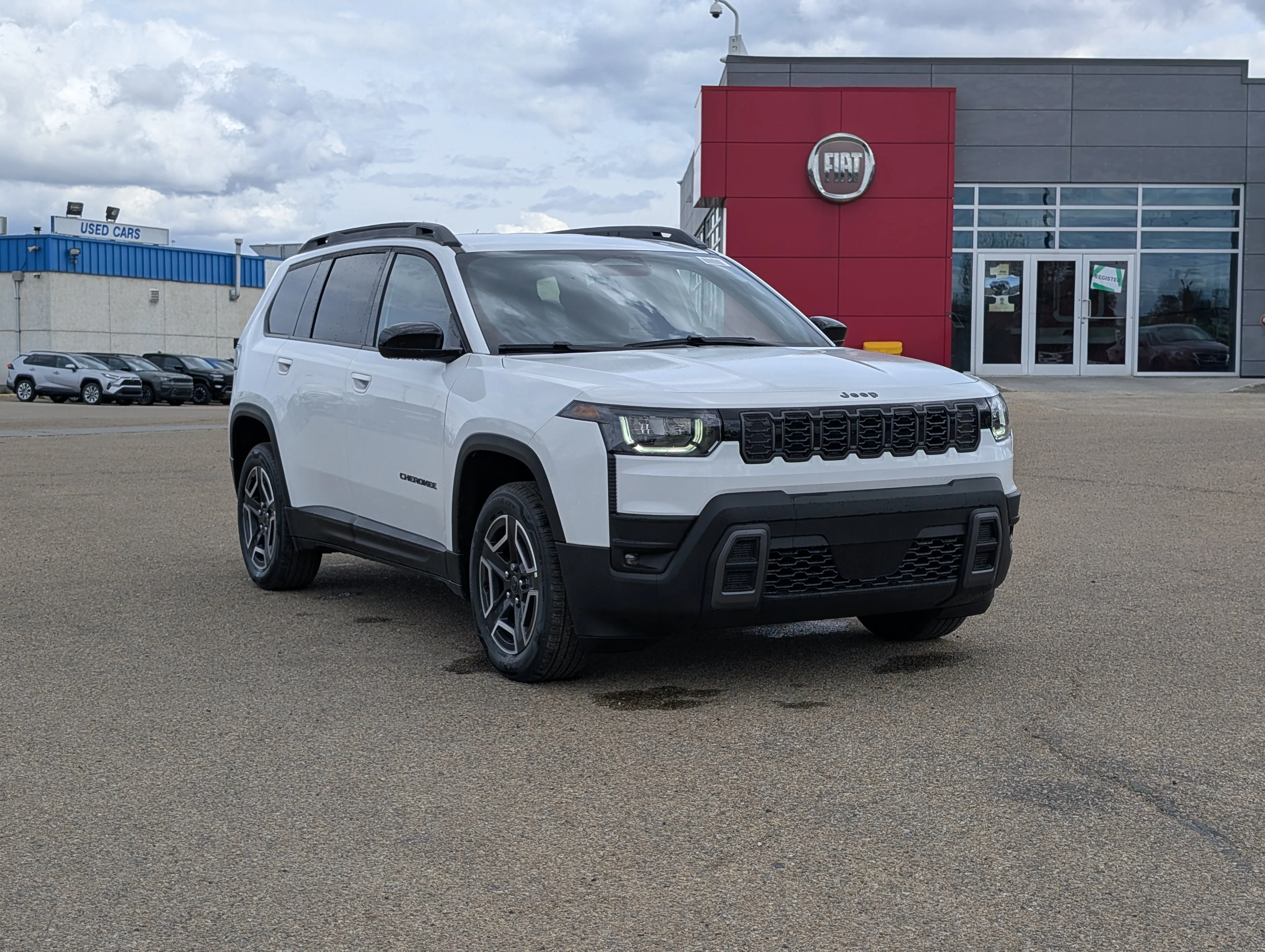 New 2026 Bright White Jeep Laredo image 9