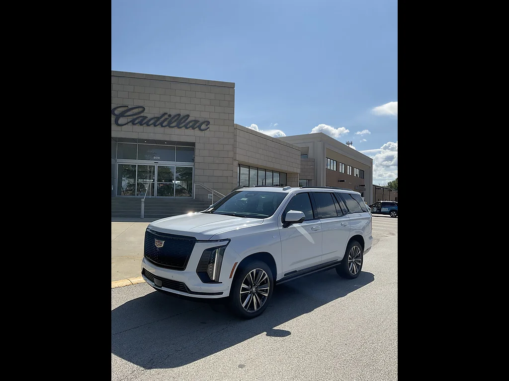 New 2026 Vibrant White Tricoat Cadillac Sport image 1