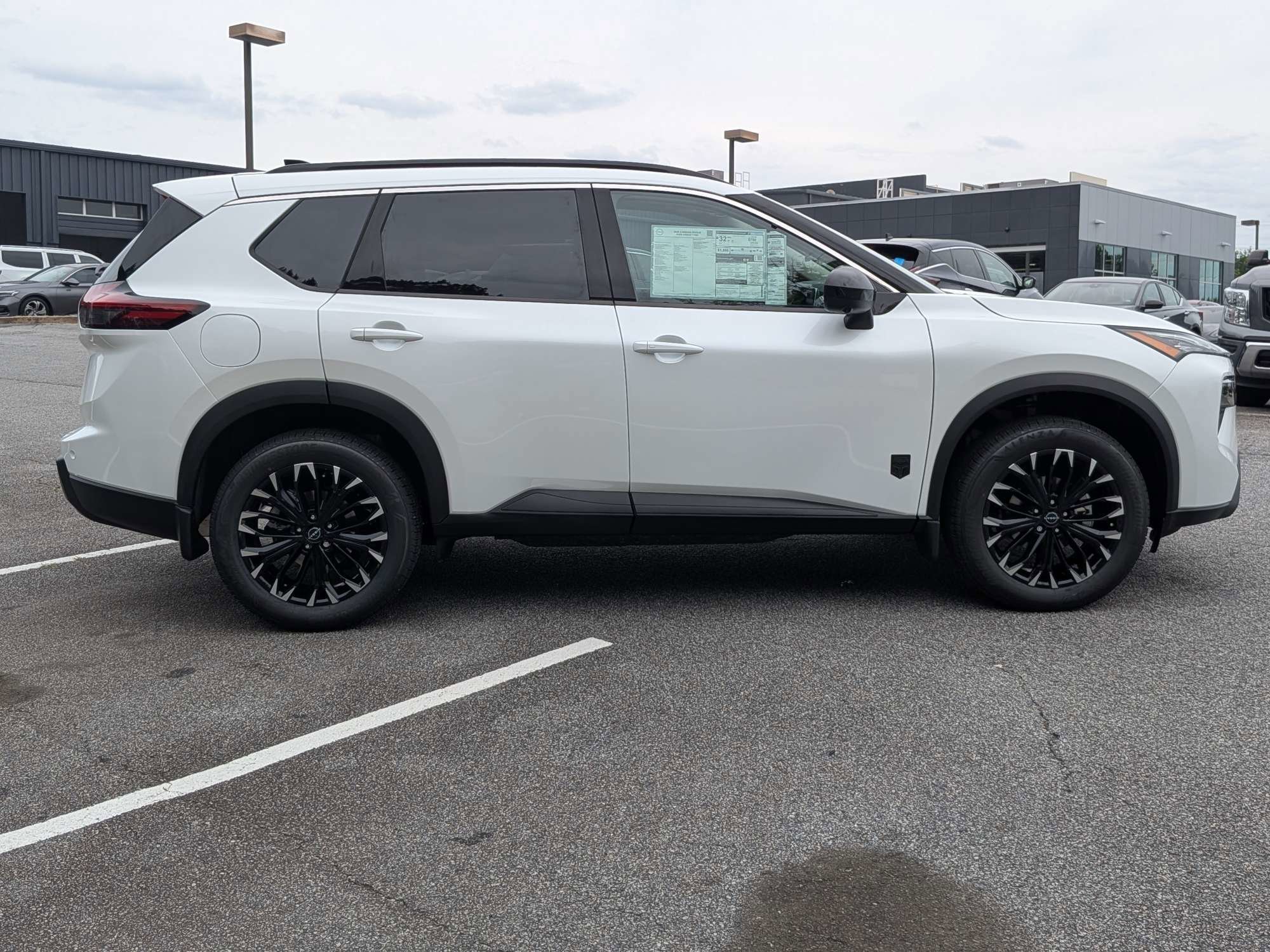 New 2026 White Nissan Dark Armor image 2
