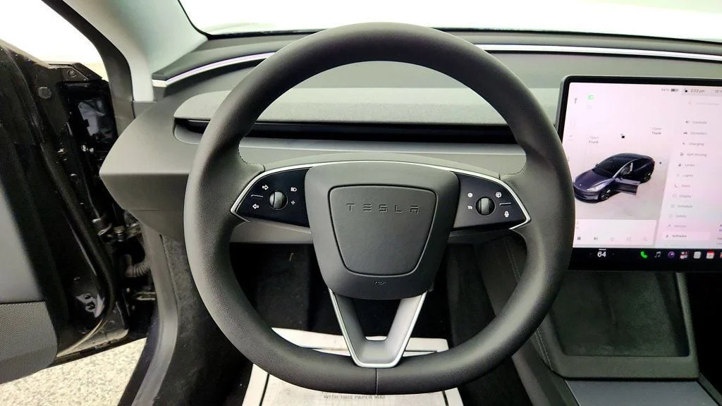 Used 2025 Stealth Grey Tesla Long Range AWD image 13