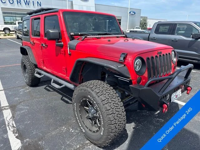 Used 2015 Firecracker Red Jeep Unlimited Sport image 3