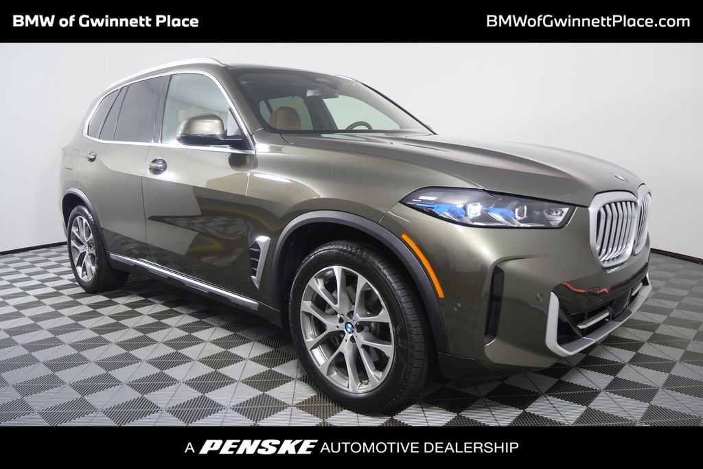 Certified Used 2026 Green Metallic BMW xDrive40i image 1
